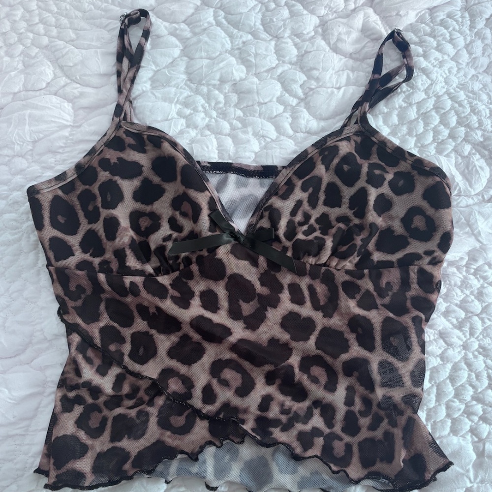 cheeta going out top